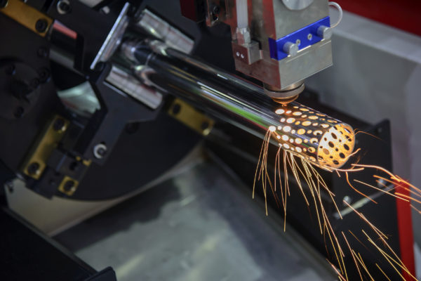 The CNC laser cutting machine make the hole at the stainless  pi
