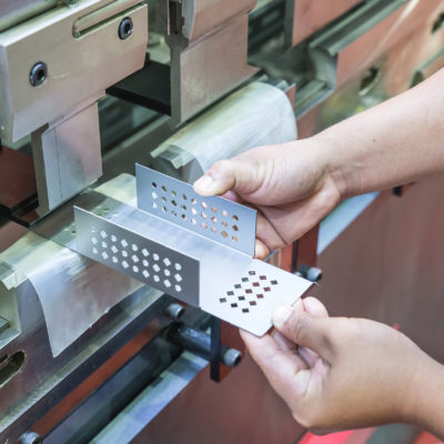 worker at manufacture workshop operating cidan folding machine